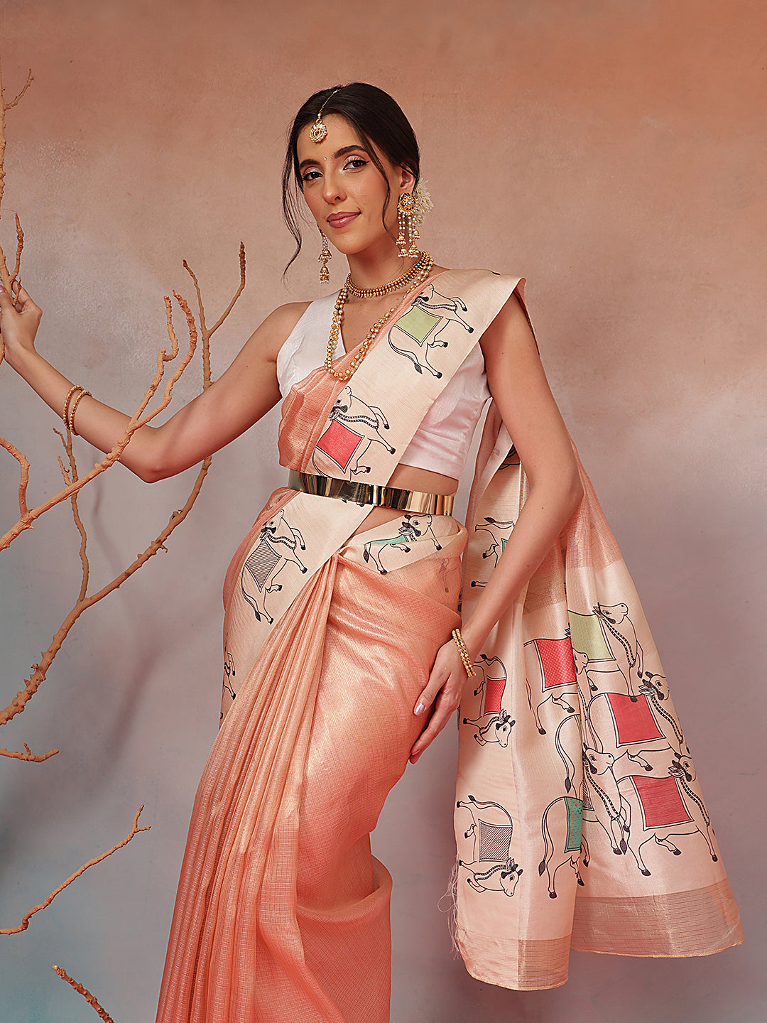Peach Folk Art Cow Motif Saree with Traditional Printed Pallu