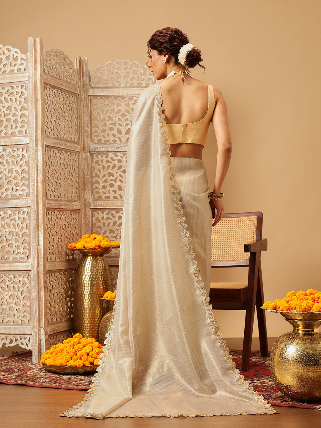 The Royal Cream Solid Muga Silk Saree Embellished With Gota Patti